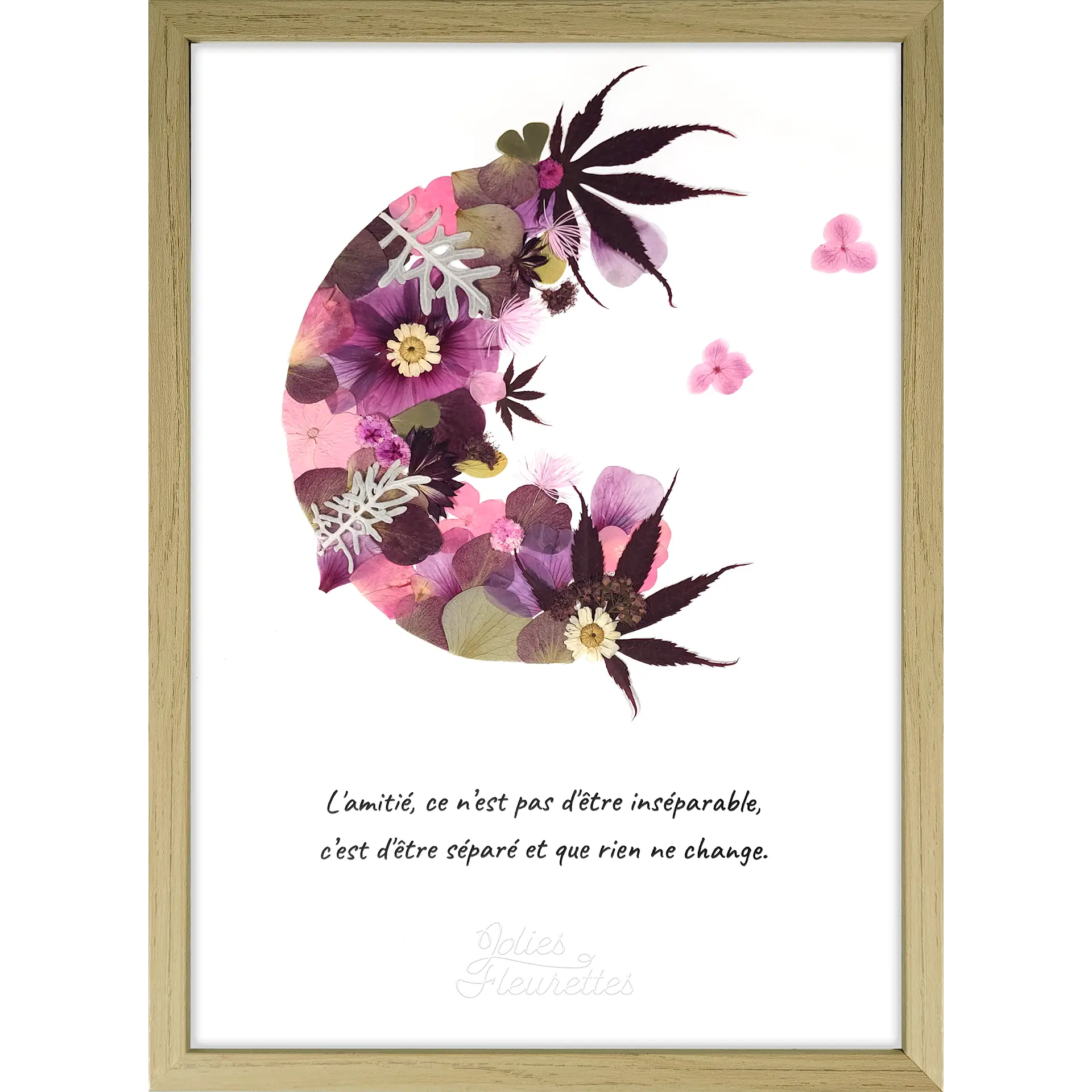 demi Lune en fleurs pressées rose accompagnée d’une phrase sur l'amitié