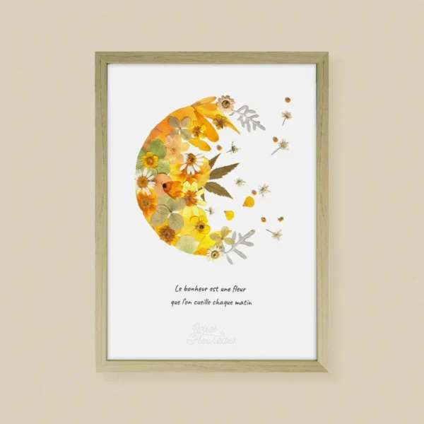 Composition d’herbier floral lune jaune avec fleurs naturelles pressées encadrement bois clair