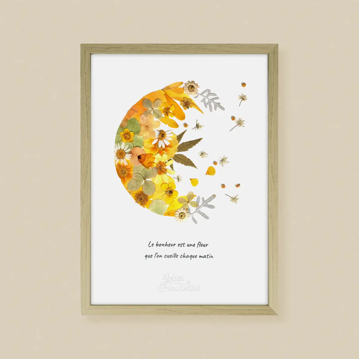 Composition d’herbier floral lune jaune avec fleurs naturelles pressées encadrement bois clair