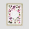 herbier de fleurs nuancés de roses avec citation inspirante cadre bois clair