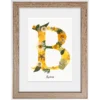Herbier lettre B de couleur jaune et lumineuse sur fond blanc
